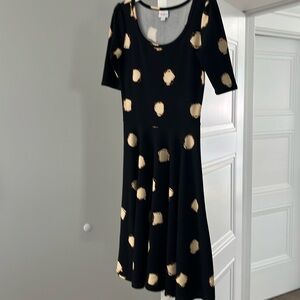 Lularoe black crème and tan print Nichole dress.